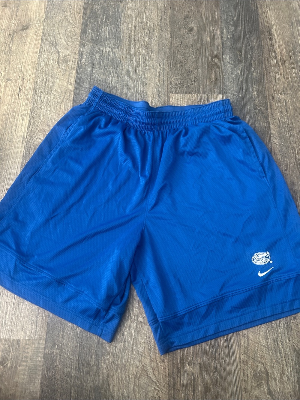 Nike Men’s Blue Athletic Shorts with White Gator Logo